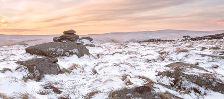 Sunrise from snow covered Belstone Tor, Dartmoor